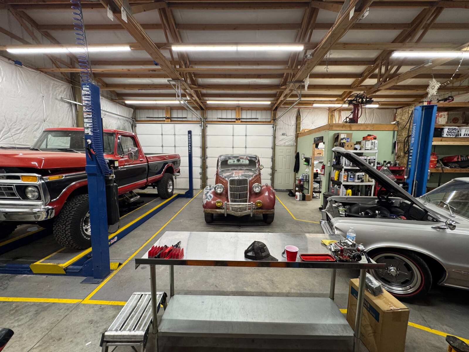 Classic vehicles inside Bastidas Garage